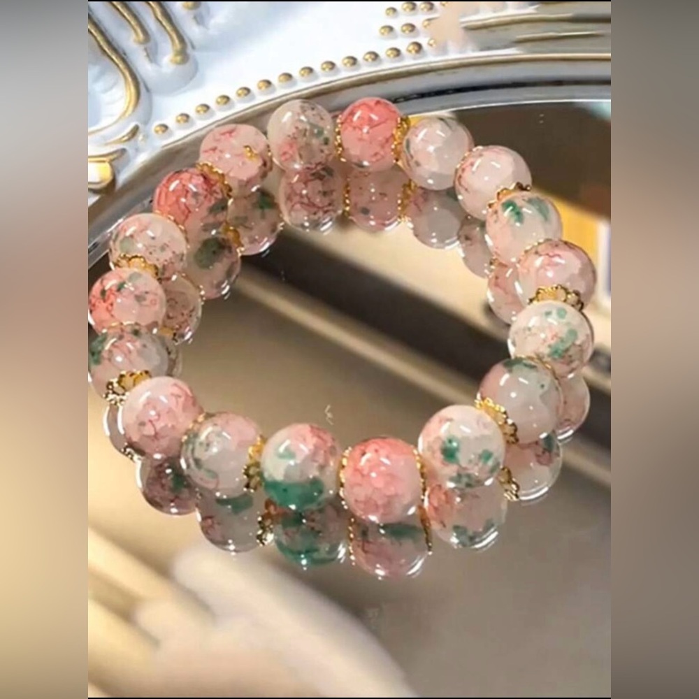 NWT Pink floral bracelet ONLY GET ONE BRACELET EVEN TBOUGH PHOTOS HAVE TWO.